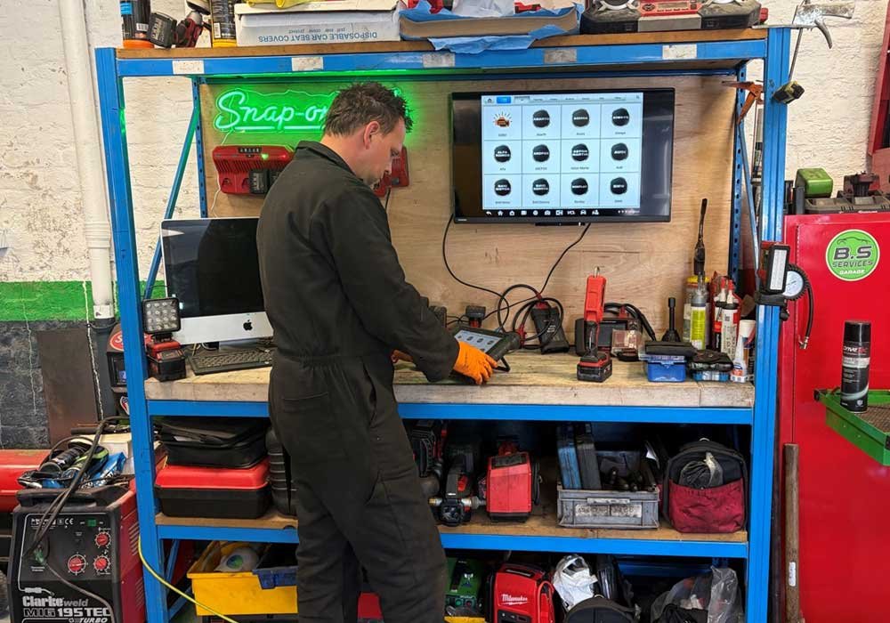 Ben of BS Services performing diagnostics for an MOT