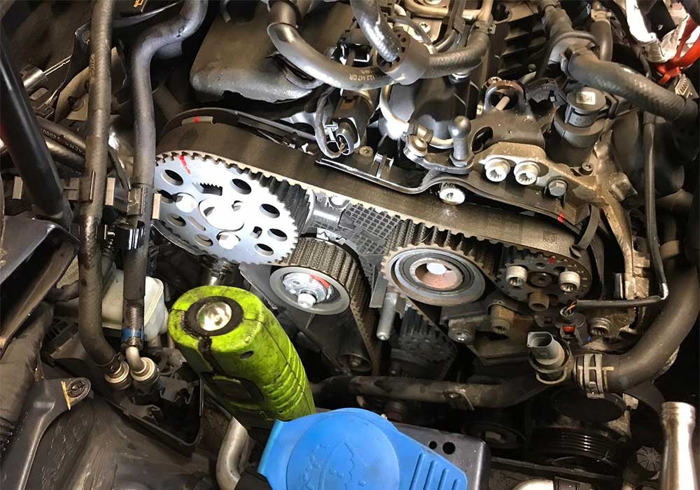 A cam belt being replaced