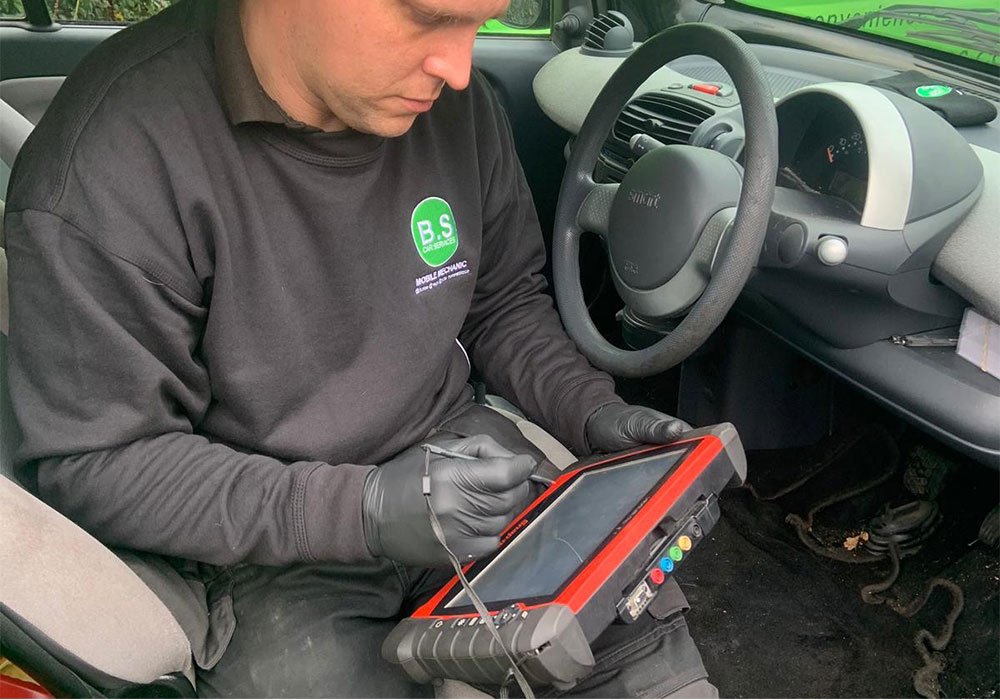 Ben performing a diagnostics check on a vehicle